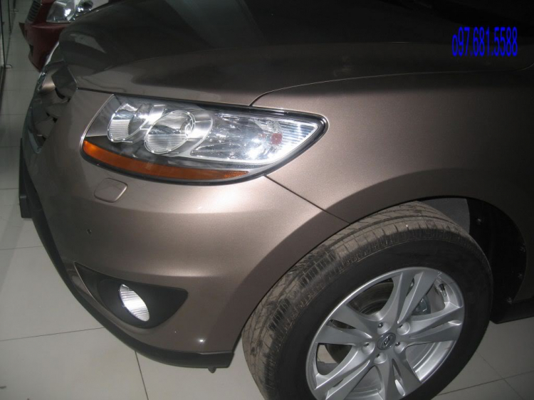 Santa Fe SLX 2011 hay Kia Sorento Limited ?