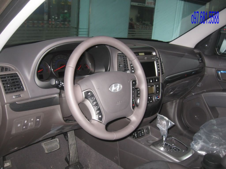 Santa Fe SLX 2011 hay Kia Sorento Limited ?