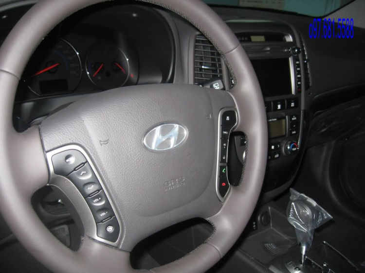 Santa Fe SLX 2011 hay Kia Sorento Limited ?