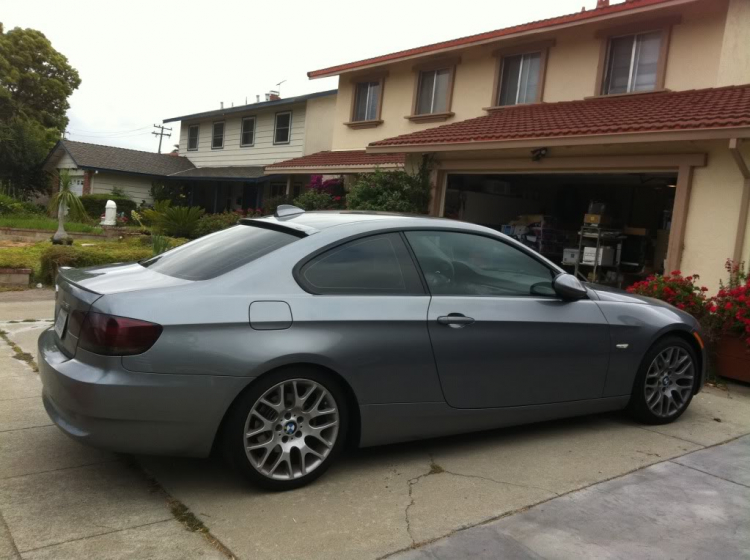 My baby in the U.S. 328i coupe E92, sport package, update hih moi tint,trunk and roof wing