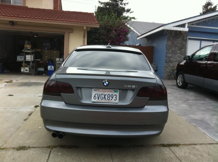 My baby in the U.S. 328i coupe E92, sport package, update hih moi tint,trunk and roof wing