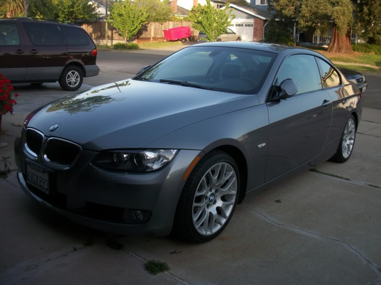 My baby in the U.S. 328i coupe E92, sport package, update hih moi tint,trunk and roof wing