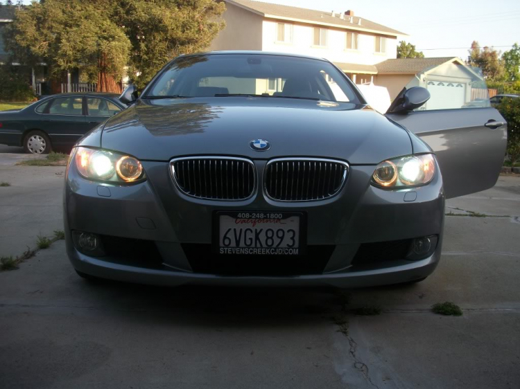 My baby in the U.S. 328i coupe E92, sport package, update hih moi tint,trunk and roof wing