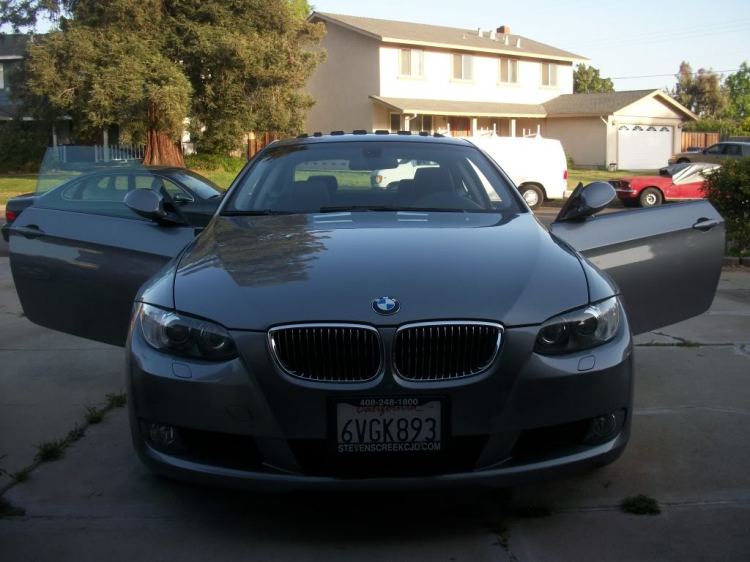 My baby in the U.S. 328i coupe E92, sport package, update hih moi tint,trunk and roof wing