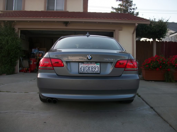 My baby in the U.S. 328i coupe E92, sport package, update hih moi tint,trunk and roof wing