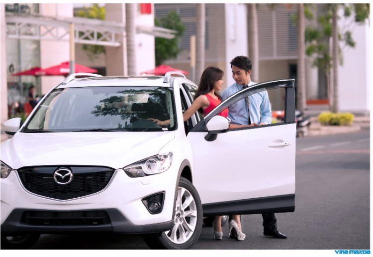 Trai tài gái sắc lái CX-5 dạo phố (đã có hình)