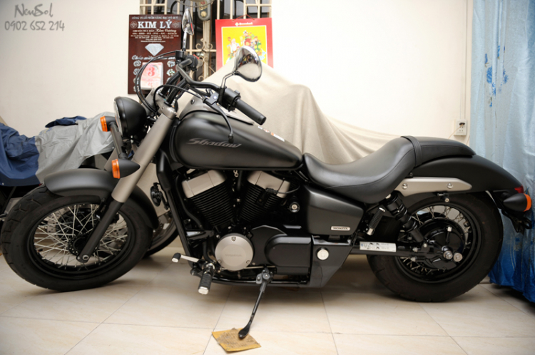 Các Bác tư vấn cho em 2 em này: CB1000r date 2009 và Harley Sporter