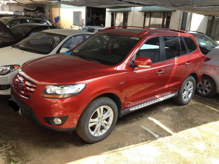 Cho em hỏi chủ xe Santafe màu cam BKS: 51A-703.68. Xe của bác nào vậy ạ?