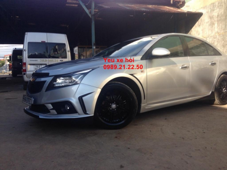 Xưởng độ Cruze,hình Tr 1,24,26 ,27,28 ,30, 31,33, 35.36,37,38,39,40,41,42 ,45 em cruze vàng cam độ