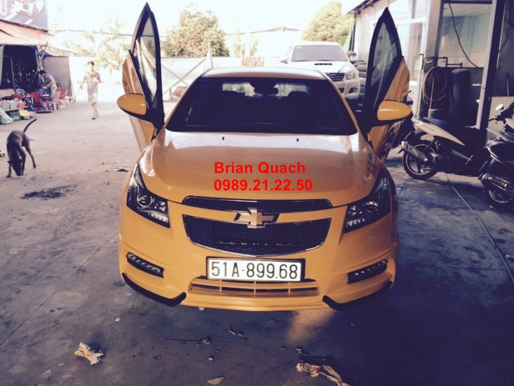 Xưởng độ Cruze,hình Tr 1,24,26 ,27,28 ,30, 31,33, 35.36,37,38,39,40,41,42 ,45 em cruze vàng cam độ