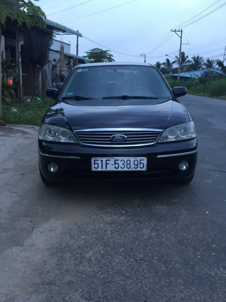 Chia sẻ Ford Laser 1.8 2004