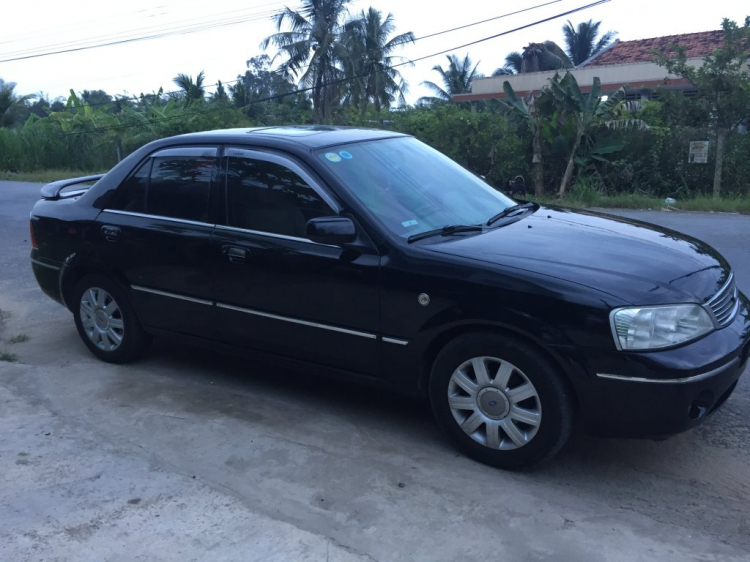 Chia sẻ Ford Laser 1.8 2004