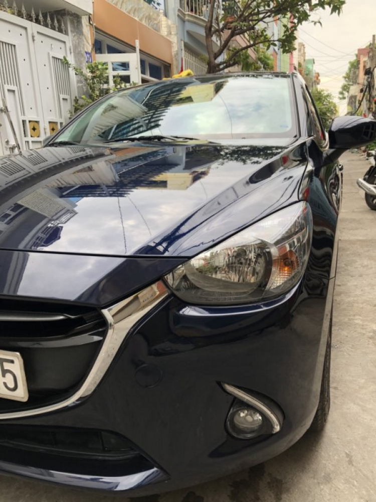 Bán xe Mazda2, BS Tp.HCM, đăng ký 5/2016, chạy 14k km, màu xanh đen