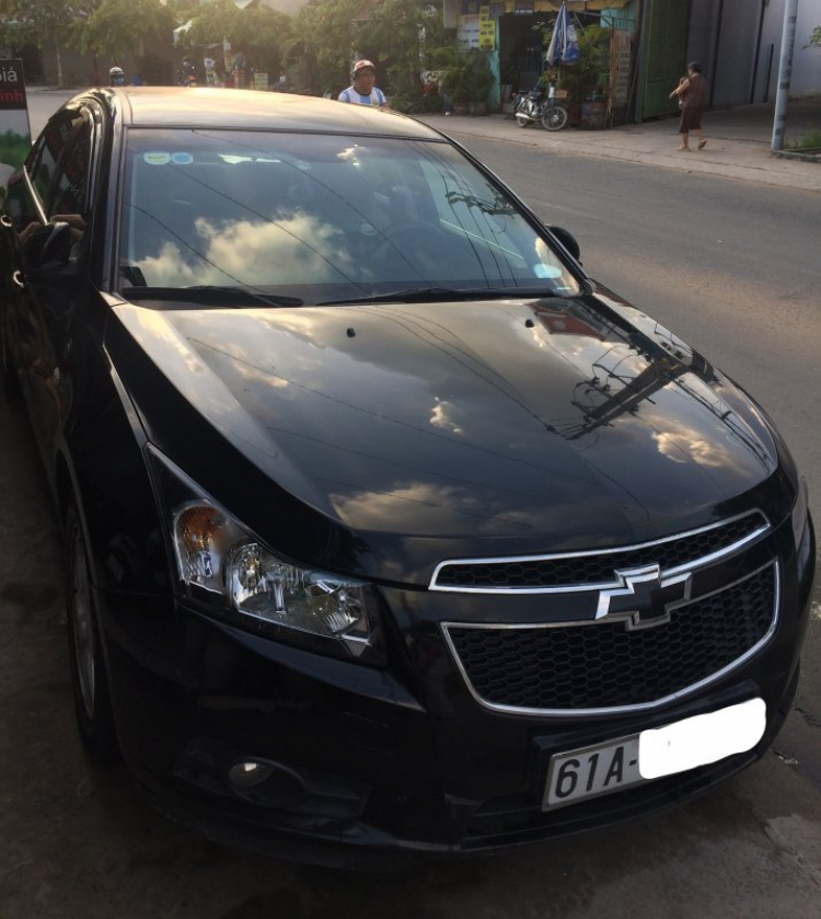 Bán xe nhà giá tốt! Chevrolet Cruze MT màu đen đi 29000 Km.