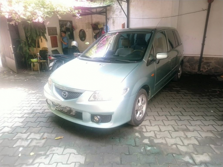 HỎI: Tìm mô tơ bơm nước rửa kính Mazda Premacy 2003?