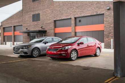 2014-mazda-3-and-2014-kia-rio-front-three-quarters-view.jpg