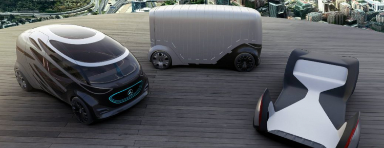 Mercedes-Benz-Vision-URBANETIC-mobility-van-concepts-parked-on-a-rooftop-wooden-platform_o-103...jpg