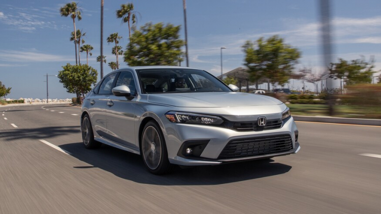 2022-Honda-Civic-Touring-front-three-quarter-in-motion-4.jpeg 2022-Honda-Civic-Touring-front-three-quarter-in-motion-4.jpeg