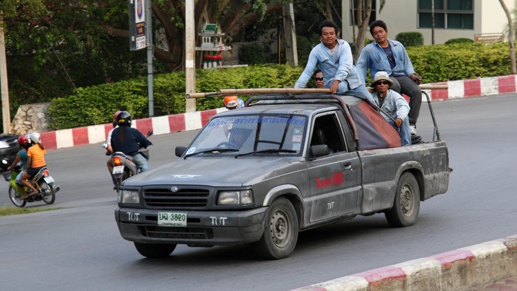 Workers_in_a_pickup_truck_in_Thailand.jpg
