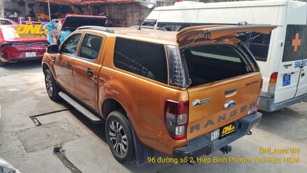 nắp thùng cao ford ranger cũ màu cam.jpg