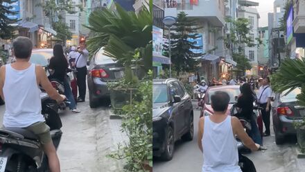 Ô tô và xe máy đối đầu nhau khi qua đường hẹp, không ai nhường ai
