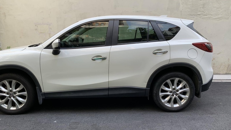 Cho em hỏi mạch điện lên xuống kính xe Mazda CX-5