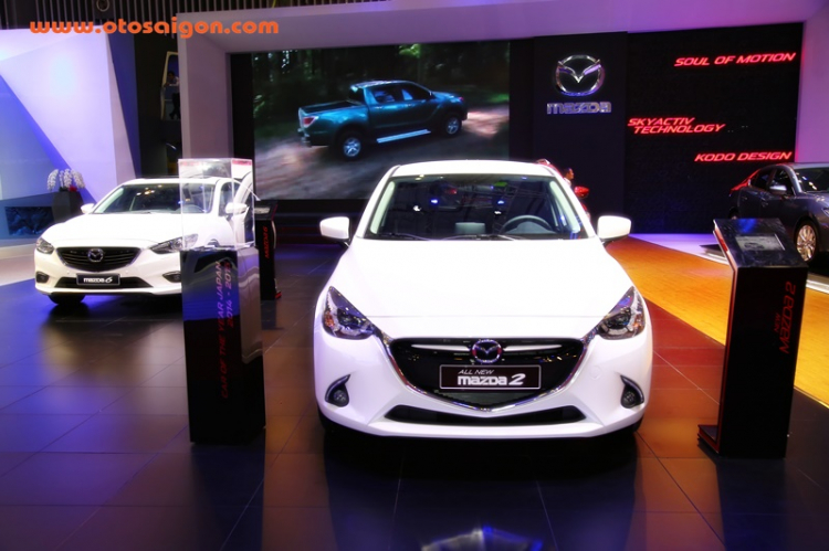 [VMS 2015] Thaco báo giá Kia Sedona và Mazda2 bản lắp ráp CKD