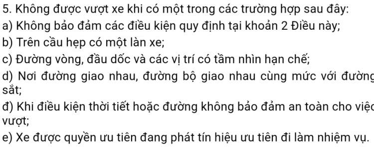 Lỗi vi phạm vượt trong đoạn đường có biển tam giác vàng cảng báo đường cong